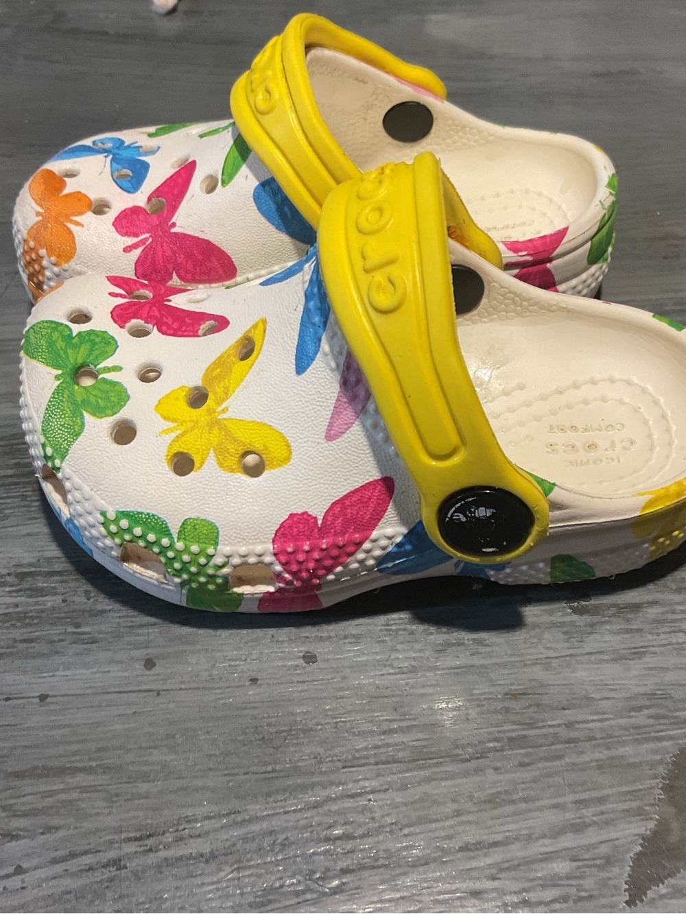 CROCS Kids White Clogs with Multicolor Butterfly Print and Yellow Strap